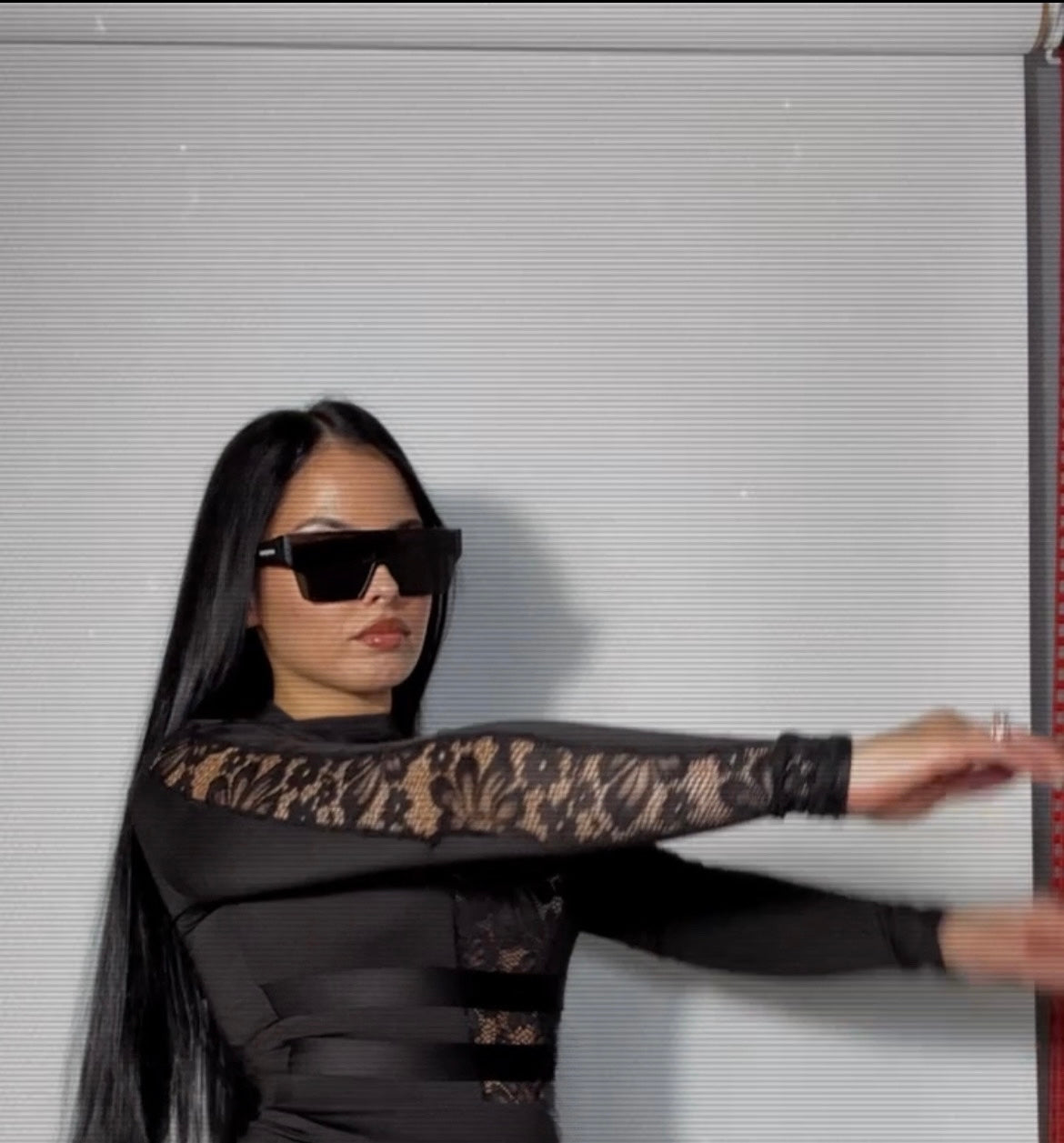 Black laced catsuit